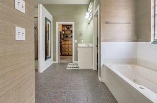 17009 Wales Green Ave, Edmond, OK 73012 - bathroom with a garden tub