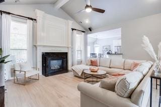 17009 Wales Green Ave, Edmond, OK 73012 - living area featuring ceiling fan, wood finished floors, and a fireplace