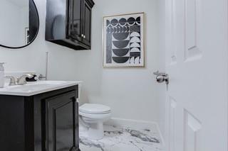 17009 Wales Green Ave, Edmond, OK 73012 - bathroom featuring vanity and toilet