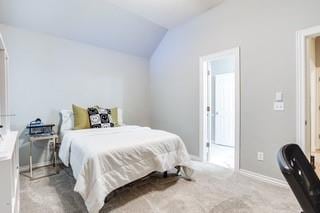 17009 Wales Green Ave, Edmond, OK 73012 - carpeted bedroom with vaulted ceiling and baseboards