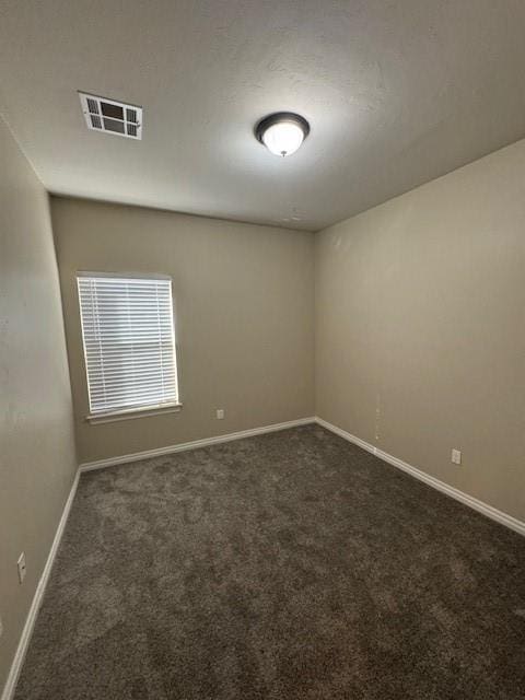 8017 NW 159th St, Edmond, OK 73013 - unfurnished room with carpet flooring and baseboards