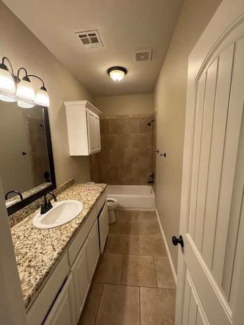 8017 NW 159th St, Edmond, OK 73013 - full bathroom with vanity, tile patterned floors, and  shower combination