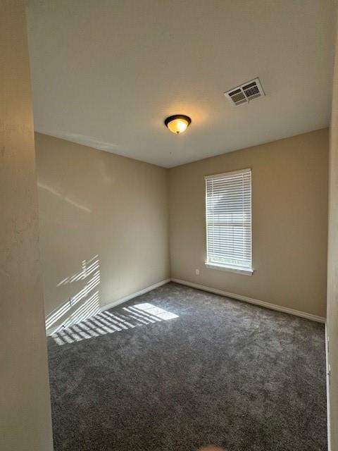 8017 NW 159th St, Edmond, OK 73013 - spare room with carpet flooring and baseboards