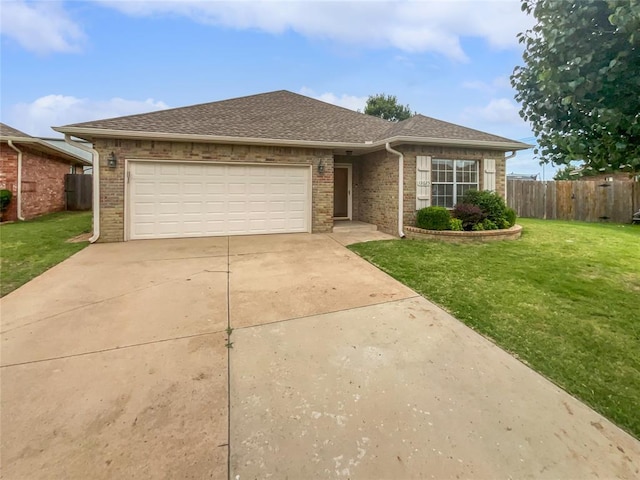 13625 Bell Ave, Oklahoma City, OK 73142 - ranch-style home with an attached garage, concrete driveway, brick siding, and a shingled roof