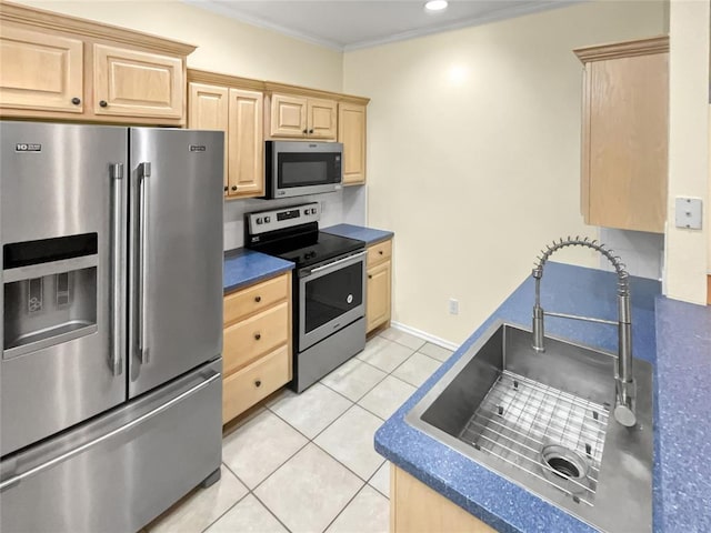 13625 Bell Ave, Oklahoma City, OK 73142 - kitchen featuring appliances with stainless steel finishes, light brown cabinetry, dark countertops, light tile patterned floors, and crown molding