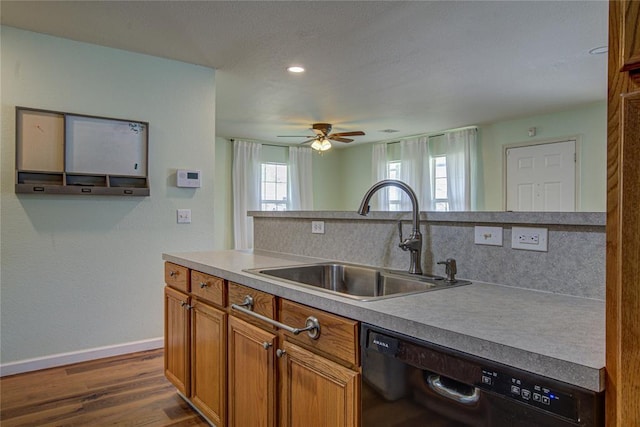 2013 Creekridge Dr, Oklahoma City, OK 73141 - kitchen featuring black dishwasher, brown cabinets, a ceiling fan, dark wood-type flooring, and recessed lighting