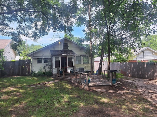 25 E Severn St, Shawnee, OK 74801 - back of property with a wooden deck