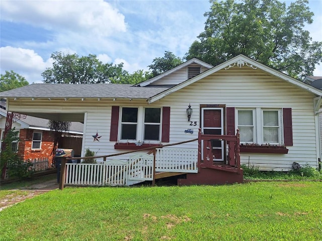 25 E Severn St, Shawnee, OK 74801 - bungalow-style home featuring roof with shingles and a carport