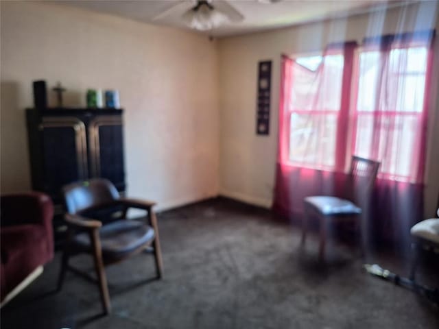 25 E Severn St, Shawnee, OK 74801 - living area featuring carpet flooring and ceiling fan