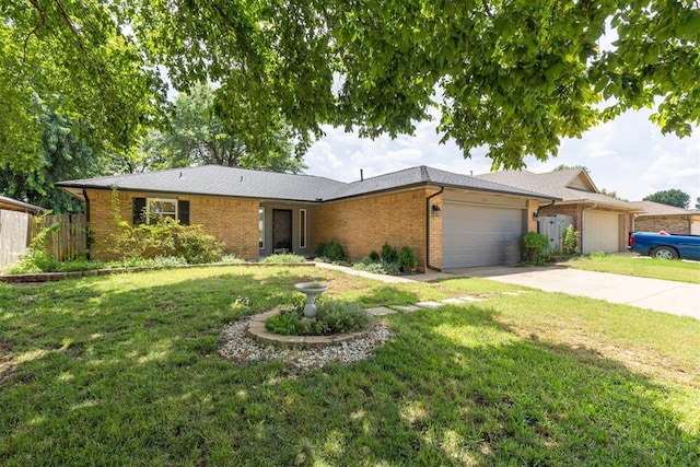 10412 NW 37th St, Yukon, OK 73099 - ranch-style house featuring an attached garage, concrete driveway, and brick siding