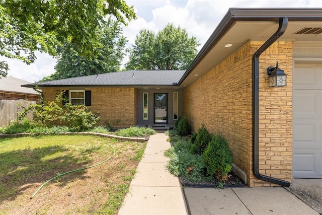 10412 NW 37th St, Yukon, OK 73099 - entrance to property with brick siding and an attached garage