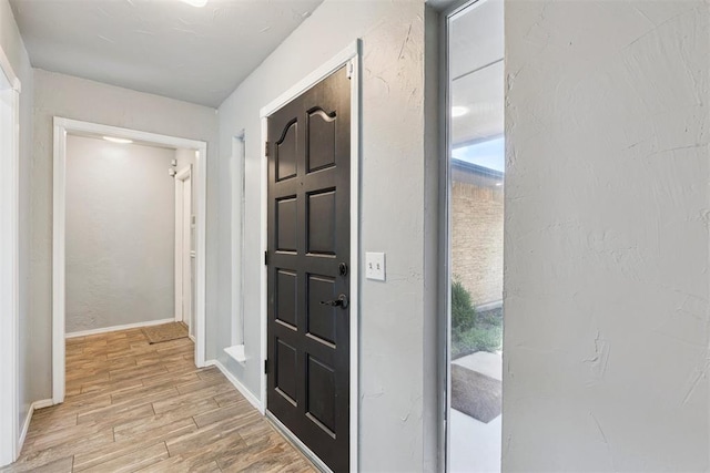 10412 NW 37th St, Yukon, OK 73099 - hall with light wood finished floors and healthy amount of natural light