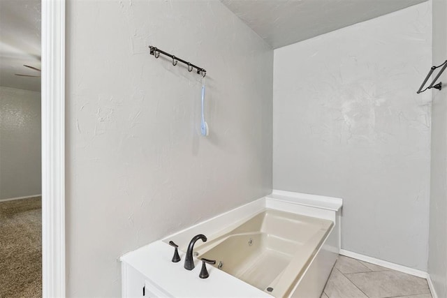 10412 NW 37th St, Yukon, OK 73099 - full bathroom featuring a bath and tile patterned floors