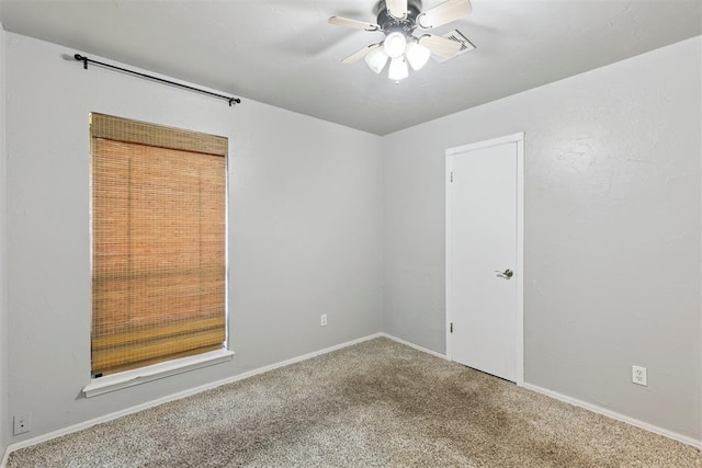 10412 NW 37th St, Yukon, OK 73099 - empty room featuring carpet floors and a ceiling fan