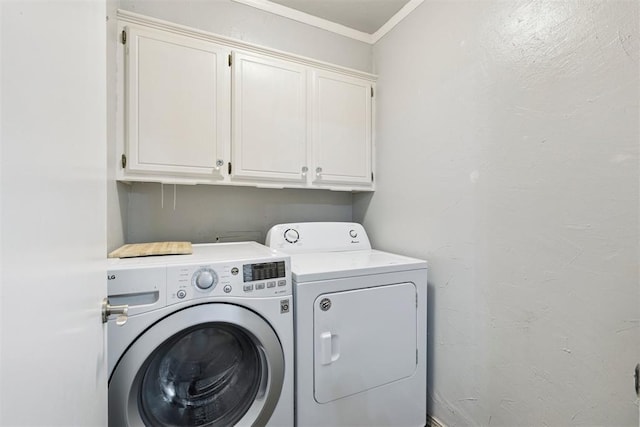 10412 NW 37th St, Yukon, OK 73099 - laundry area with cabinet space, washer and dryer, and crown molding