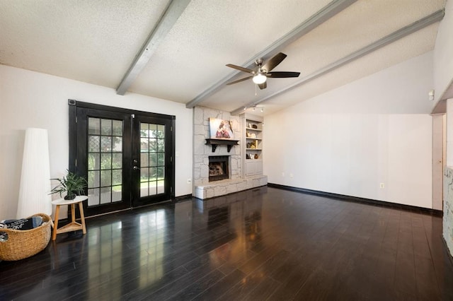 10520 Ricky Ln, Midwest City, OK 73130 - unfurnished living room with ceiling fan, french doors, wood finished floors, and a textured ceiling