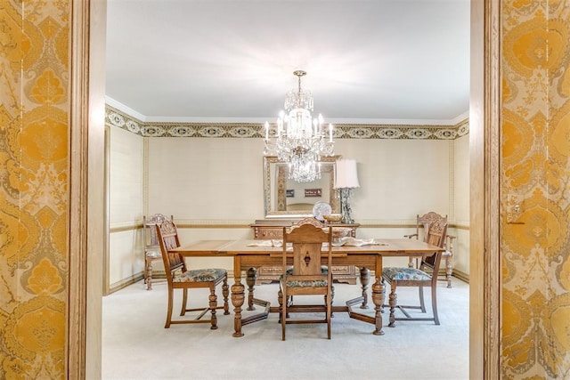 2532 Lancaster Ln, Oklahoma City, OK 73116 - carpeted dining area with a chandelier and crown molding
