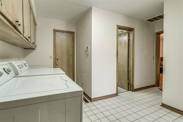 2532 Lancaster Ln, Oklahoma City, OK 73116 - laundry area with washer and clothes dryer and cabinet space