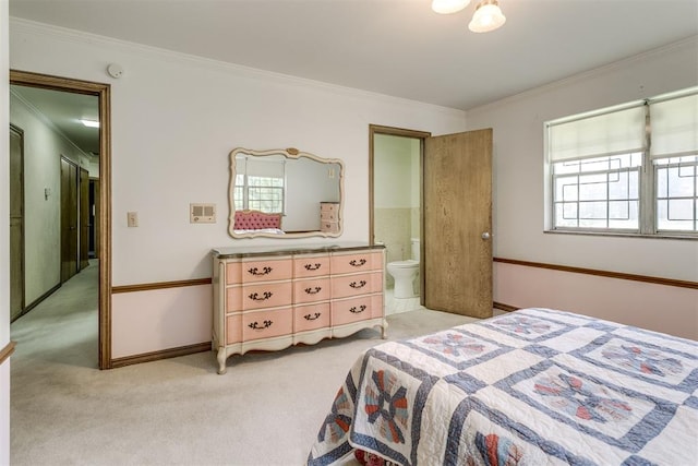 2532 Lancaster Ln, Oklahoma City, OK 73116 - bedroom featuring light carpet, ornamental molding, and ensuite bath