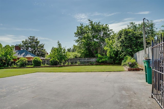 2532 Lancaster Ln, Oklahoma City, OK 73116 - fenced backyard with a patio area