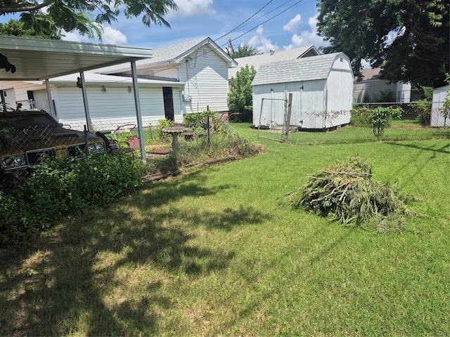 621 S 9th St, Yukon, OK 73099 - view of yard with a shed and a garage