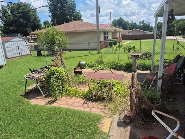 621 S 9th St, Yukon, OK 73099 - view of yard with a storage shed