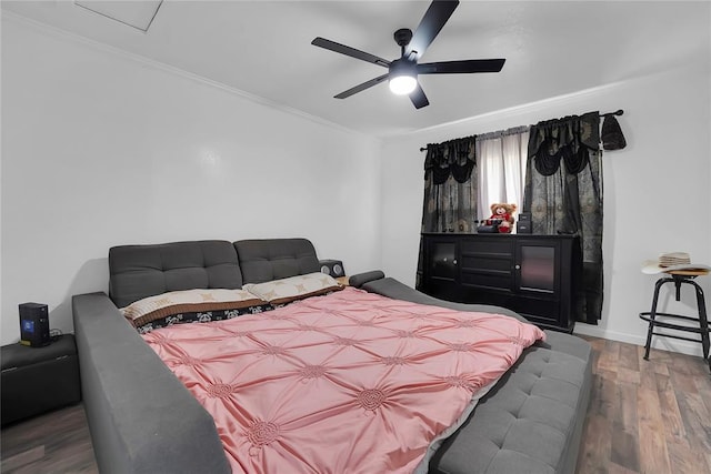 615 N Lowe, Hobart, OK 73651 - bedroom featuring wood finished floors, crown molding, and ceiling fan