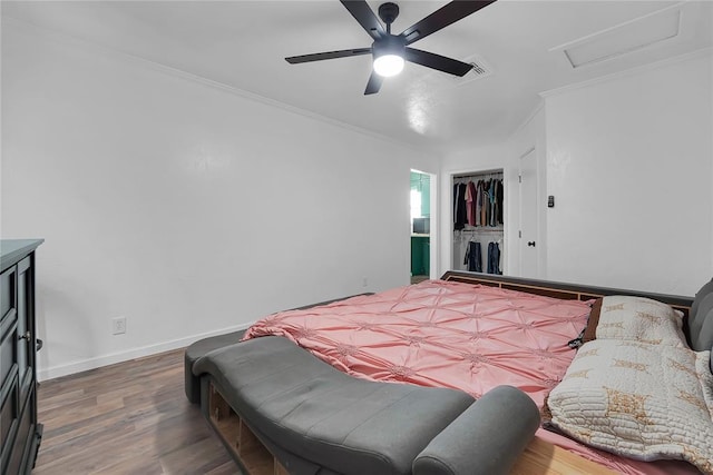 615 N Lowe, Hobart, OK 73651 - bedroom featuring ornamental molding, wood finished floors, attic access, ceiling fan, and a closet