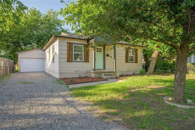 6109 NW 55th St, Oklahoma City, OK 73122 - bungalow with crawl space, gravel driveway, an outbuilding, and a detached garage