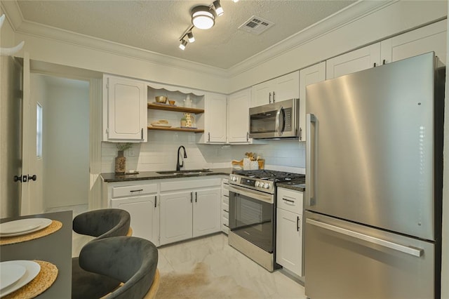 6109 NW 55th St, Oklahoma City, OK 73122 - kitchen featuring stainless steel appliances, light marble finish floors, ornamental molding, white cabinets, and open shelves