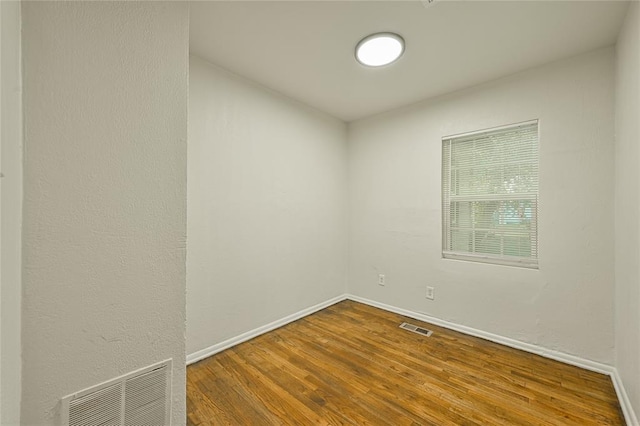 6109 NW 55th St, Oklahoma City, OK 73122 - empty room with wood finished floors and baseboards