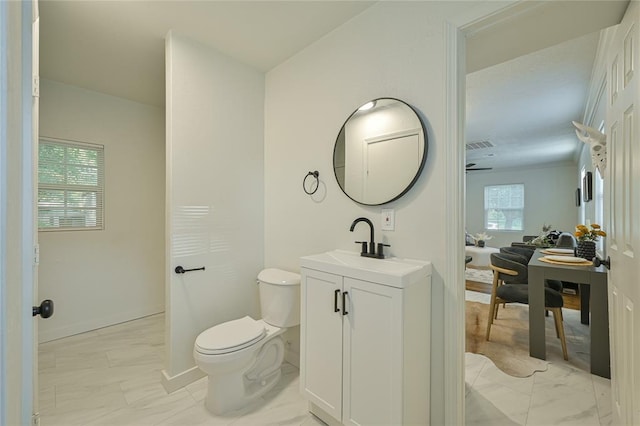 6109 NW 55th St, Oklahoma City, OK 73122 - bathroom featuring marble finish floors and vanity