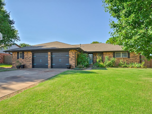 617 Hoehner Ave, Okarche, OK 73762 - single story home featuring an attached garage, brick siding, and concrete driveway