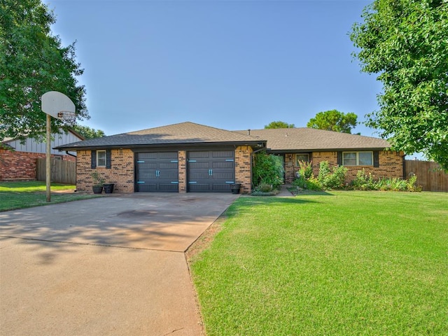 617 Hoehner Ave, Okarche, OK 73762 - ranch-style home with driveway, brick siding, and a garage