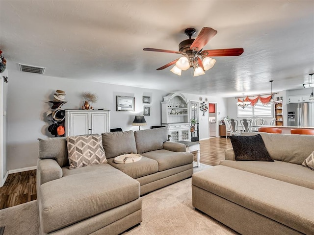 617 Hoehner Ave, Okarche, OK 73762 - living room featuring ceiling fan and wood finished floors