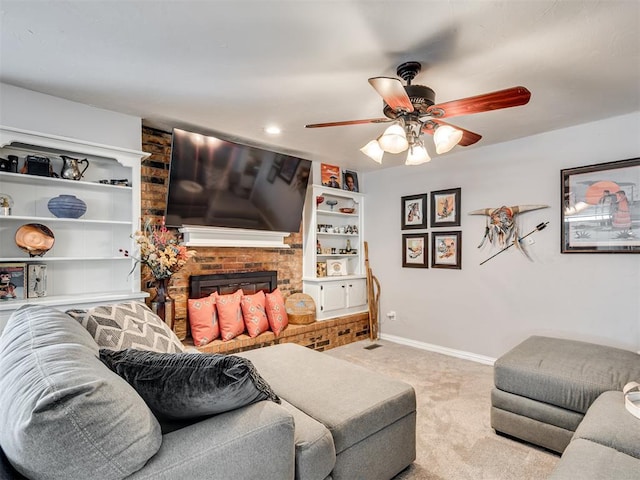 617 Hoehner Ave, Okarche, OK 73762 - carpeted living area featuring a ceiling fan, a fireplace, built in shelves, and recessed lighting