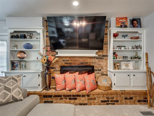 617 Hoehner Ave, Okarche, OK 73762 - living room featuring a fireplace