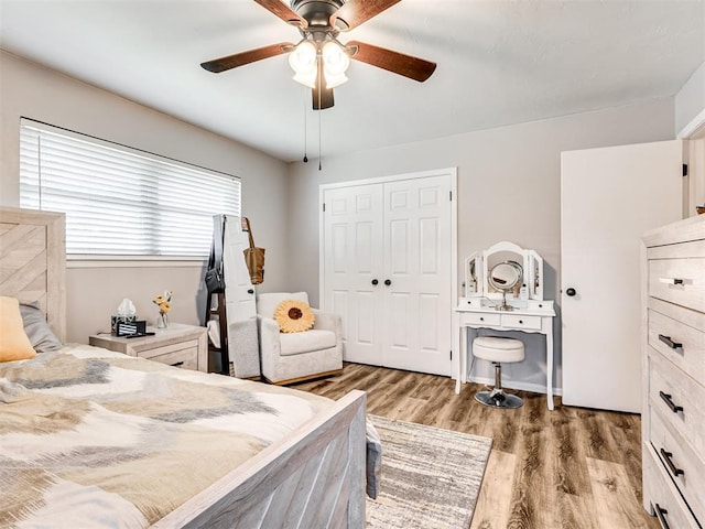 617 Hoehner Ave, Okarche, OK 73762 - bedroom featuring light wood-style flooring, a closet, and a ceiling fan