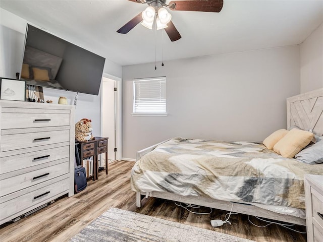 617 Hoehner Ave, Okarche, OK 73762 - bedroom featuring light wood finished floors and ceiling fan