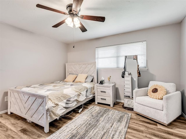 617 Hoehner Ave, Okarche, OK 73762 - bedroom with wood finished floors and ceiling fan