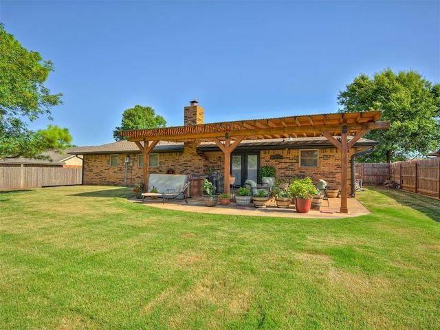 617 Hoehner Ave, Okarche, OK 73762 - rear view of property featuring a chimney, a pergola, a fenced backyard, a patio, and brick siding