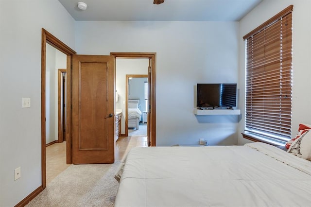 825 Silver Tree Dr, Choctaw, OK 73020 - bedroom featuring light colored carpet and a ceiling fan