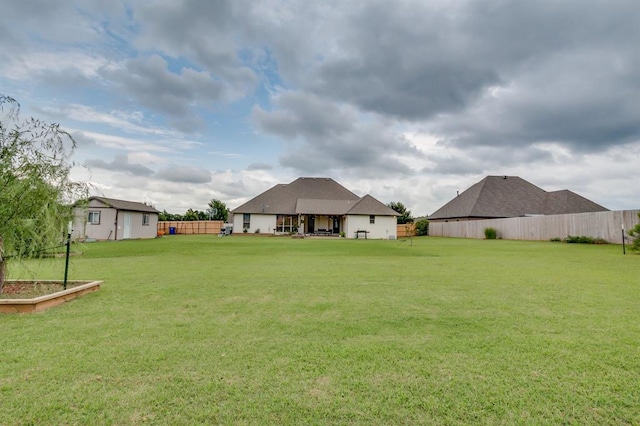 825 Silver Tree Dr, Choctaw, OK 73020 - fenced backyard featuring an outbuilding