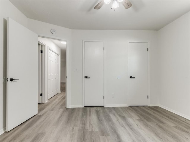 2550 Clarke St, Choctaw, OK 73020 - unfurnished bedroom featuring light wood-style flooring and ceiling fan