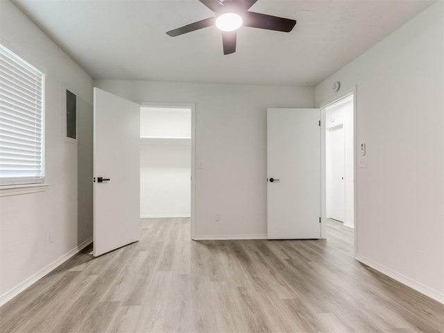 2550 Clarke St, Choctaw, OK 73020 - empty room with light wood-style flooring, a ceiling fan, and a smoke detector