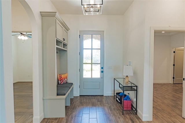 14704 Ashore Dr, Oklahoma City, OK 73142 - mudroom featuring dark wood-style flooring, arched walkways, and a ceiling fan