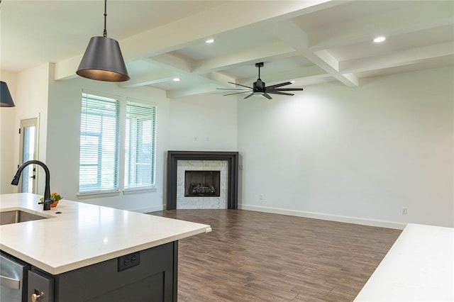 14704 Ashore Dr, Oklahoma City, OK 73142 - kitchen with wood finished floors, coffered ceiling, light countertops, recessed lighting, and beamed ceiling
