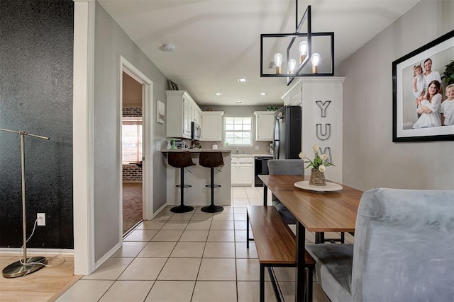 4155 NW Terrace Hills Rd, Piedmont, OK 73078 - dining room featuring light tile patterned floors, a chandelier, and recessed lighting