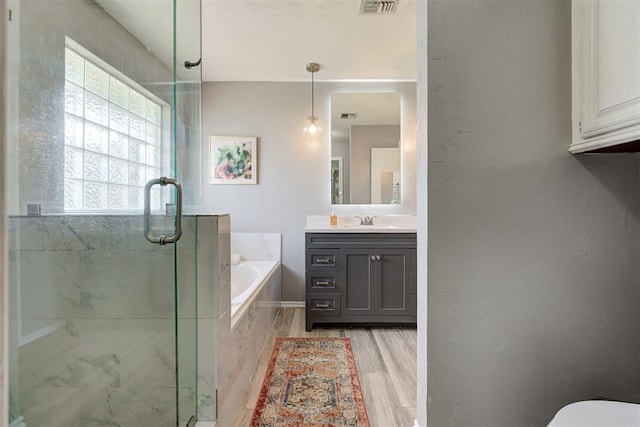 4155 NW Terrace Hills Rd, Piedmont, OK 73078 - full bathroom featuring vanity, a bath, and a shower stall
