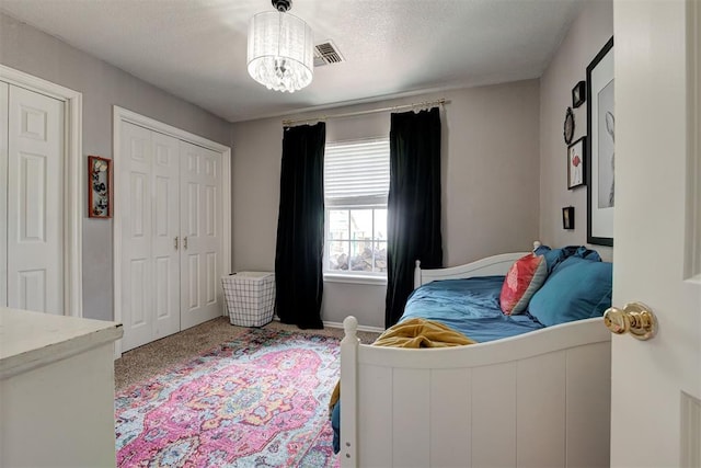 4155 NW Terrace Hills Rd, Piedmont, OK 73078 - bedroom with carpet and a chandelier